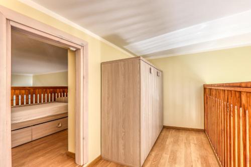 a bedroom with a closet and a bed at Residence Viviverde in Terni