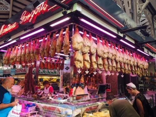 a store with a bunch of meat hanging above it at One Bed Apartment overlooking Jalon Valley, Costa Blanca in Alcalalí