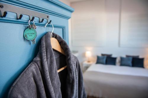 Ένα ή περισσότερα κρεβάτια σε δωμάτιο στο Hotel B&B Casa Arena Sevilla