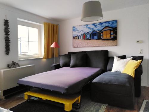 Tempat tidur dalam kamar di Usedoms Kleines Ostseeglück #1 in Peenemünde bis 4 Personen, Zuganreise möglich