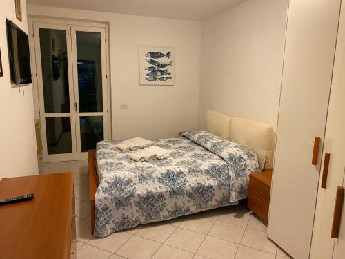 Posteľ alebo postele v izbe v ubytovaní Casa Edoardo