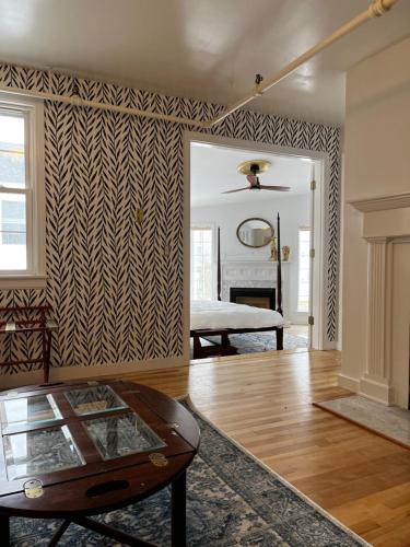 a living room with a zebra patterned wall at Queen Anne's Revenge in Bar Harbor