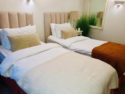 Postelja oz. postelje v sobi nastanitve Contemporary large apartment in an ideal location