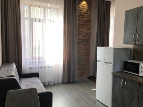 Kuchyň nebo kuchyňský kout v ubytování T&S Apart-Hotel