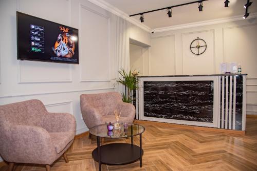 TV a/nebo společenská místnost v ubytování T&S Apart-Hotel