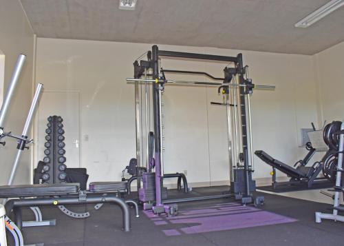 a gym with several treadmills and machines at diRoma Fiori - Apartamentos JN in Caldas Novas