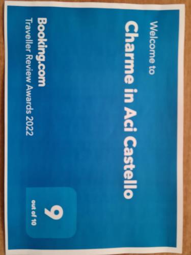 Certificado, premio, señal o documento que está expuesto en Charme in Aci Castello