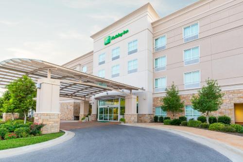 a rendering of a hotel building with a driveway at Holiday Inn Temple - Belton by IHG in Temple