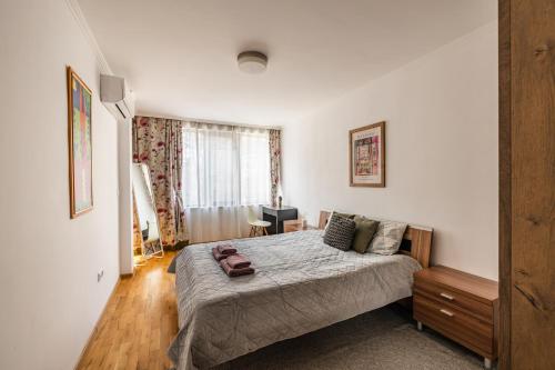 Postel nebo postele na pokoji v ubytování Matisse Hotflat