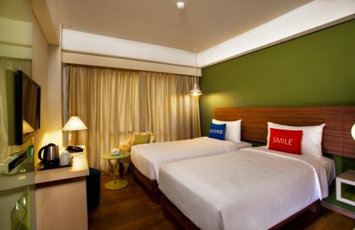 
A bed or beds in a room at Ion Bali Benoa
