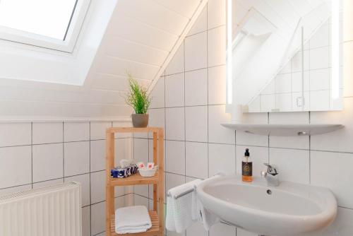 Ένα μπάνιο στο Ferien-Apartment im Genusshotel Hirschen (Südschwarzwald)