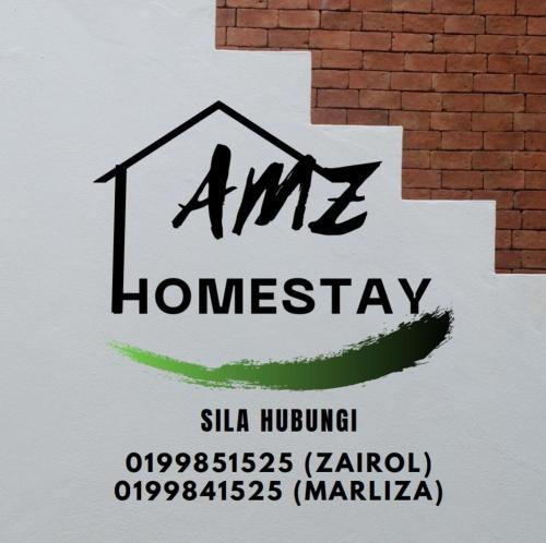 a sign for an amr homiversary with a house at AMZ HOMESTAY in Masjid Tanah