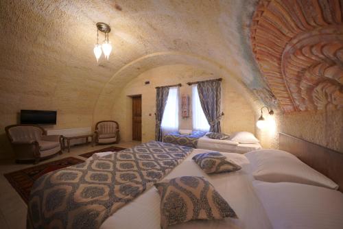 Katil atau katil-katil dalam bilik di Grand Cappadocia Hotel