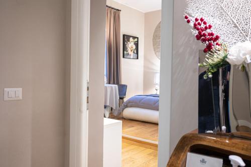 a living room and a bedroom with a room with at Cardilli Luxury Rooms in Rome
