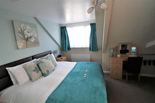 Postel nebo postele na pokoji v ubytování Cranmore Bed & Breakfast