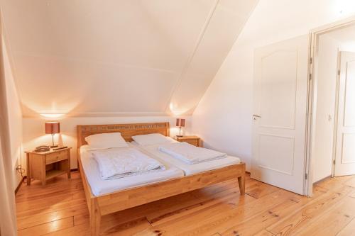 Postel nebo postele na pokoji v ubytování Buitenplaats Callantsoog
