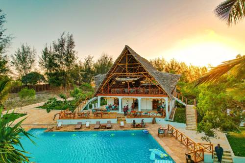 uma representação de uma casa com piscina em Zanzibella Hotel & SPA em Kiwengwa