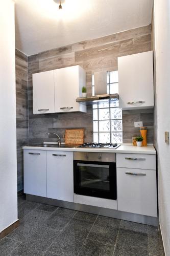 Dapur atau dapur kecil di Residence Chiaro di Luna