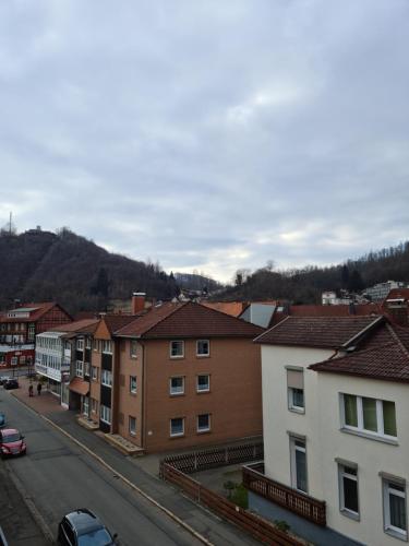 a view of a town with houses and a street at Pension Kreihe im Harz in Bad Lauterberg