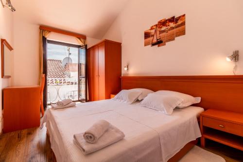 Posteľ alebo postele v izbe v ubytovaní Sunny beach apartment Lavica