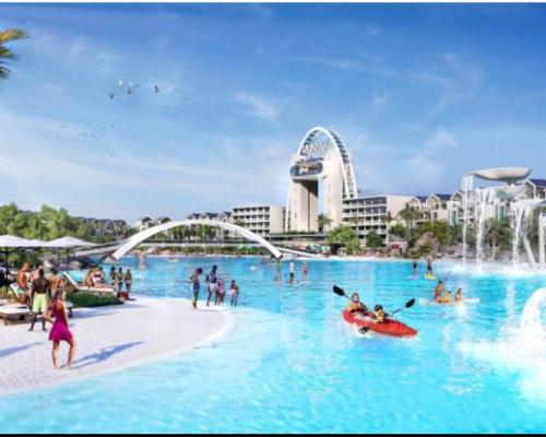 a group of people in the water at a theme park at Waterfall Apartments Waterfall Cres in Midrand