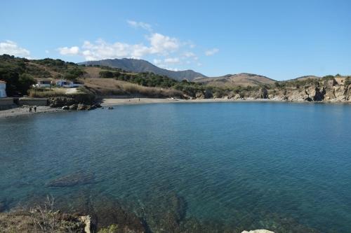 a beach with a large body of water at Bastide le Petit Clos - les 2 Gîtes in Perpignan