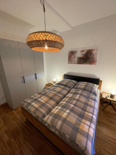 Ένα ή περισσότερα κρεβάτια σε δωμάτιο στο Stadtvilla Haug die exklusiven Ferienwohnungen im Harz