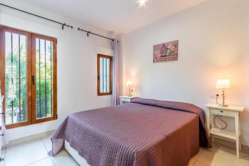 Ένα ή περισσότερα κρεβάτια σε δωμάτιο στο Altea Apartamento