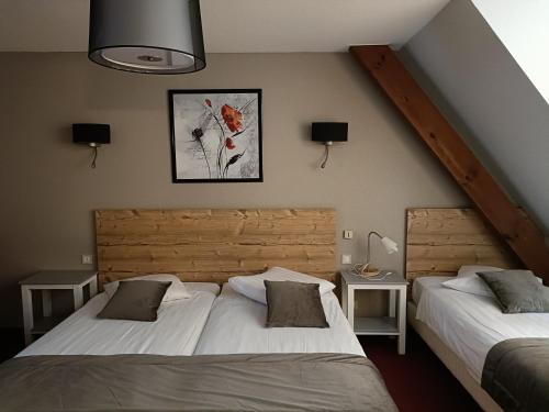 Säng eller sängar i ett rum på Hotel Beysang