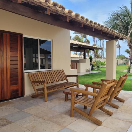Un patio o zona al aire libre en Sunset Beach Taíba Hotel