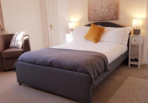 Ein Bett oder Betten in einem Zimmer der Unterkunft The Green Views Apartment Families, Tourists, Professionals