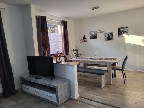 Μια τηλεόραση ή/και κέντρο ψυχαγωγίας στο Ferienhaus Femke