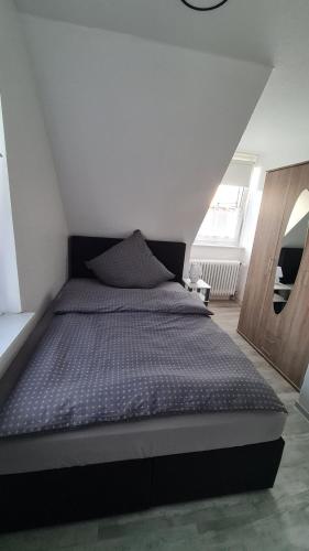 Ένα ή περισσότερα κρεβάτια σε δωμάτιο στο Ferienhaus Femke
