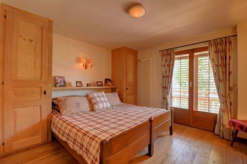 Ski-in, Chalet-style appt Central Verbier - 1 Min Walk to Liftにあるベッド