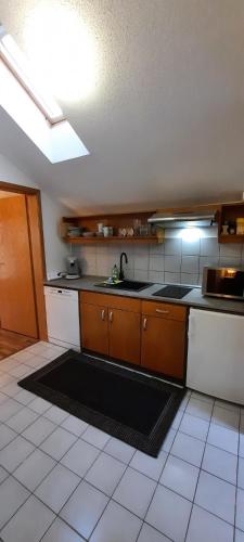 Kuchyň nebo kuchyňský kout v ubytování Ferienwohnung Wildgatter
