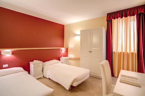 Voodi või voodid majutusasutuse Top Floor Navona toas
