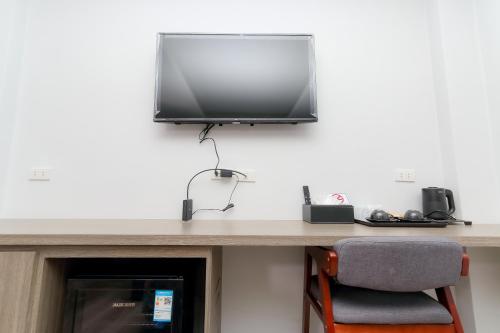 TV a/nebo společenská místnost v ubytování Seed Boutique Hotel