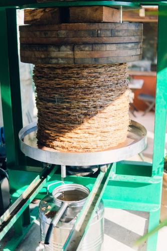 a stack of twine on top of a metal shelf at Finca Heredad La Boquilla in Enguera