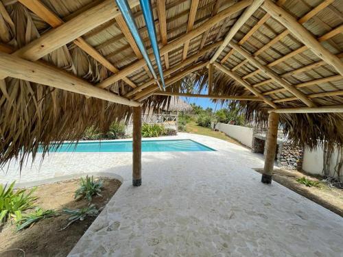The swimming pool at or near Villa Punta Coral