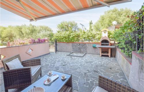 Nice home in Tanuanella Budoni with 2 Bedrooms