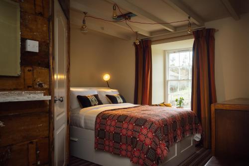 Postel nebo postele na pokoji v ubytování Penrhiw Farm B & B
