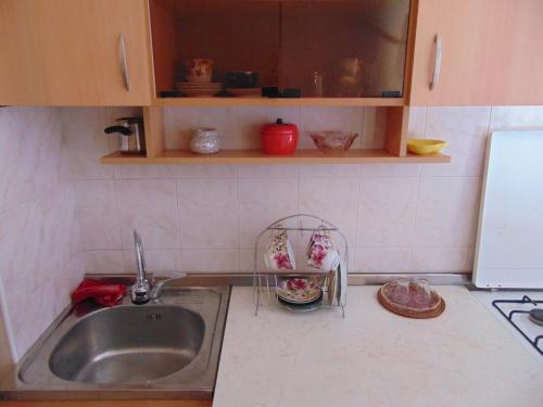 a kitchen with a sink and a counter top at Apartment in the center of the city - Vera in Tbilisi City