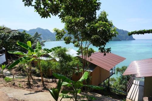 a house with a view of the water at Phi Phi Seaside Bungalow in Phi Phi Don