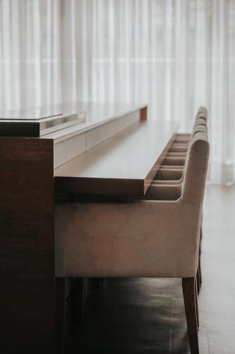 a desk with a chair in front of a desk at Duplex NYC Berrini - 1506 in Sao Paulo