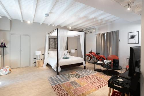Un ou plusieurs lits dans un hébergement de l'établissement Lo Schiaccianoci Bed&Breakfast de Charme