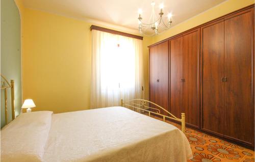 Katil atau katil-katil dalam bilik di Casa Vacanze La Torre