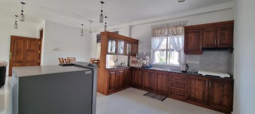 Кухня или мини-кухня в Grand Station Residence - Jesmin
