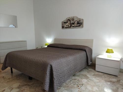 เตียงในห้องที่ Santo Spirito 2 - by Nadia