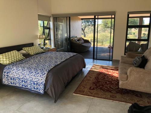 Ένα ή περισσότερα κρεβάτια σε δωμάτιο στο Barn Owl Lodge, Mjejane Game Reserve, Greater Kruger Park