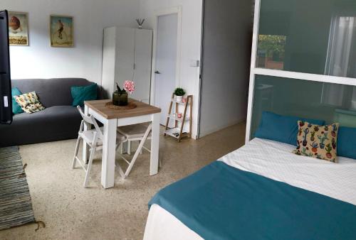 Posteľ alebo postele v izbe v ubytovaní Loft con acceso a piscina